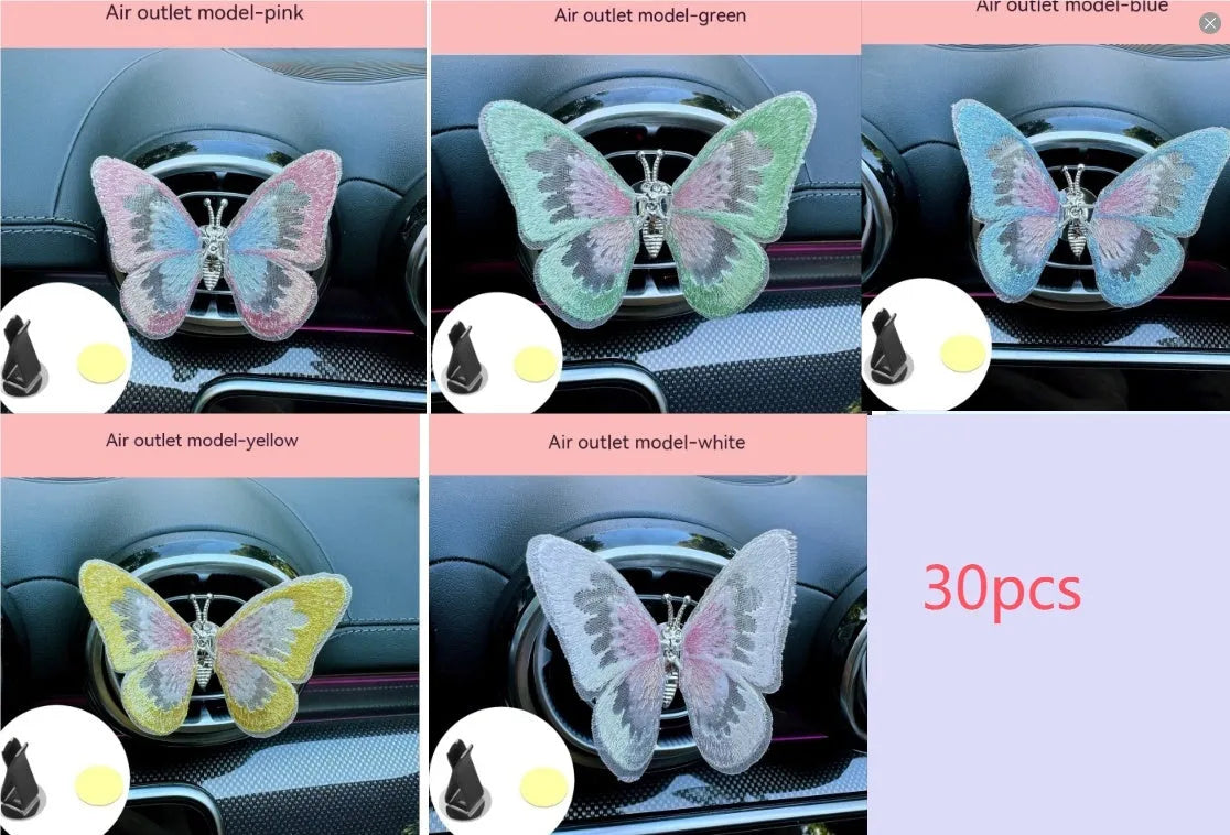 Moving embroidery butterfly decoration on car centre console air vent in pink fabric