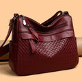 Women's soft PU leather crossbody bag in black with diamond pattern stitching, vertical rectangle shape 28x22x11cm