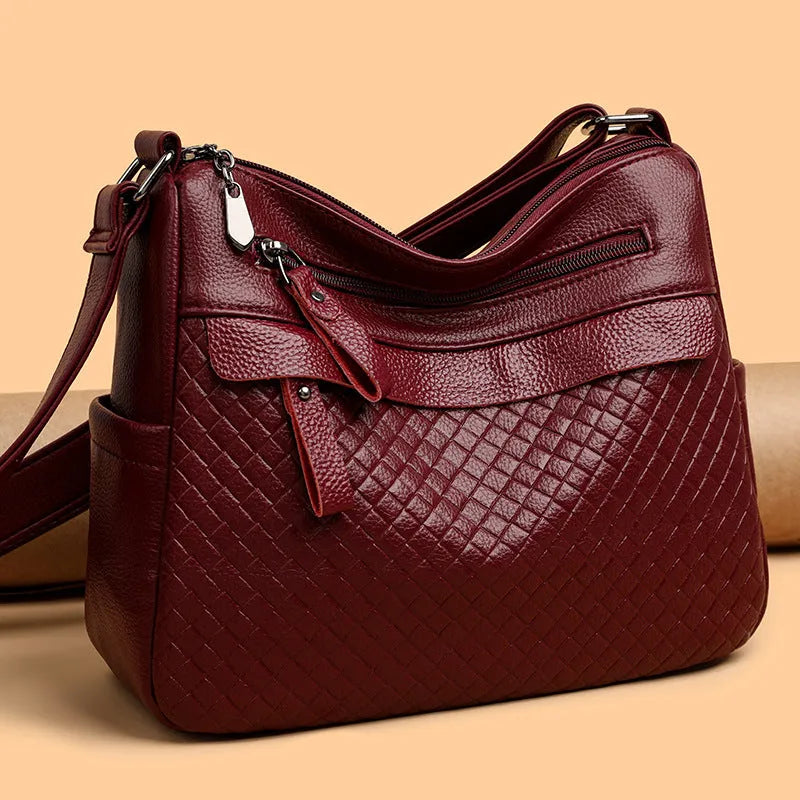 Women's soft PU leather crossbody bag in black with diamond pattern stitching, vertical rectangle shape 28x22x11cm