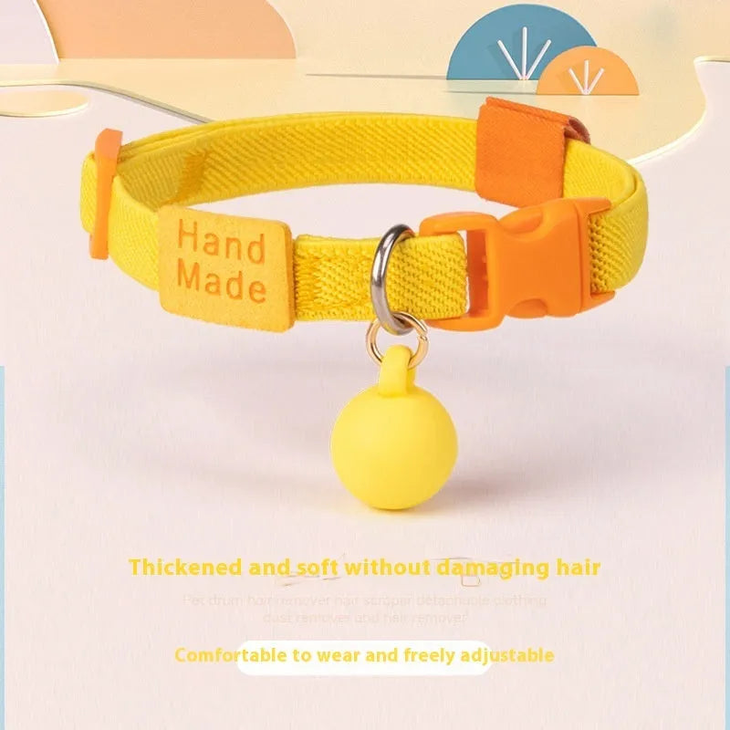 A small dog collar made from high elasticity polyester in an adjustable size, shown in one of seven available colours.
