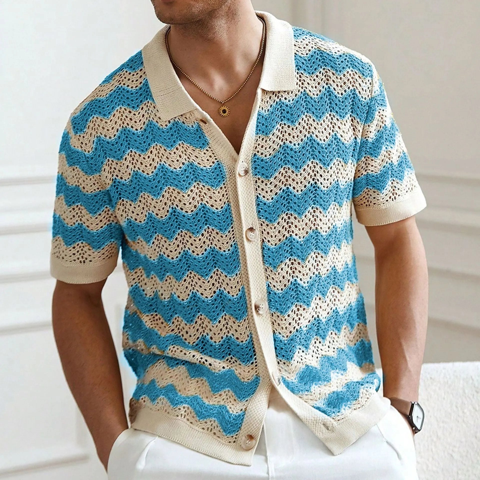 Short sleeve corrugated pattern sweater in blue colour with textured jacquard construction