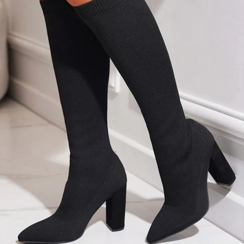 Women's large size stretch pointed toe chunky heel boots in black, brown, and red