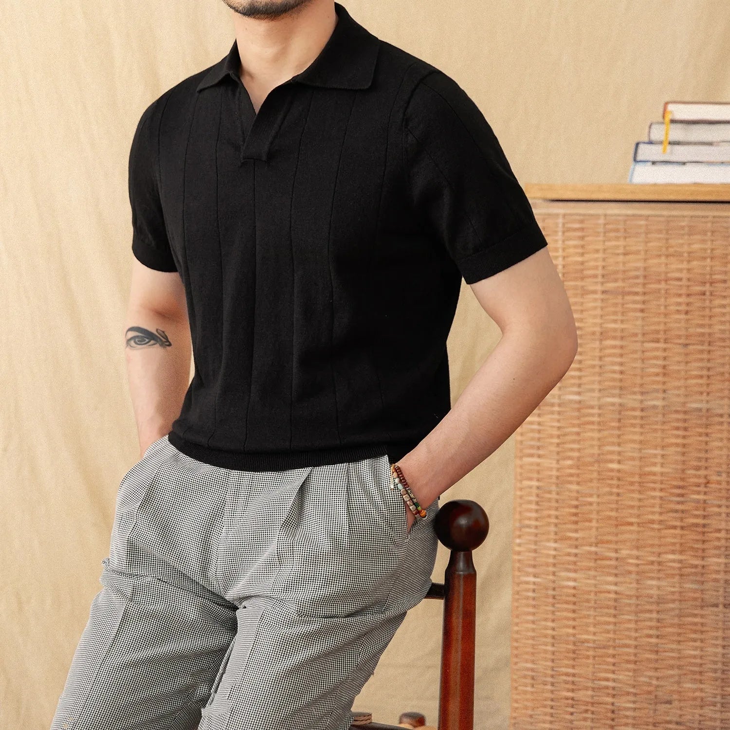 Purple cotton and linen knitted polo top with short sleeves, a seagull collar, and a sunken stripe pattern.