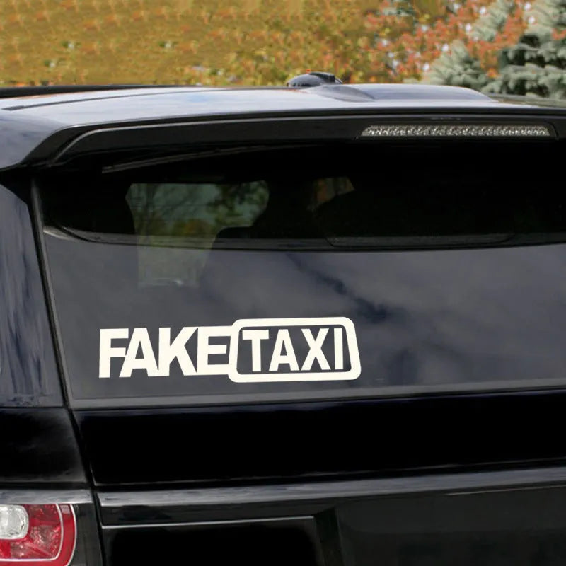 FAKE TAXI car warning sticker in yellow, black and white colour options measuring 20 by 8 centimetres