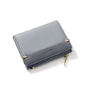 Short ladies wallet with zipper closure showing multi card slots and compartments in PU leather
