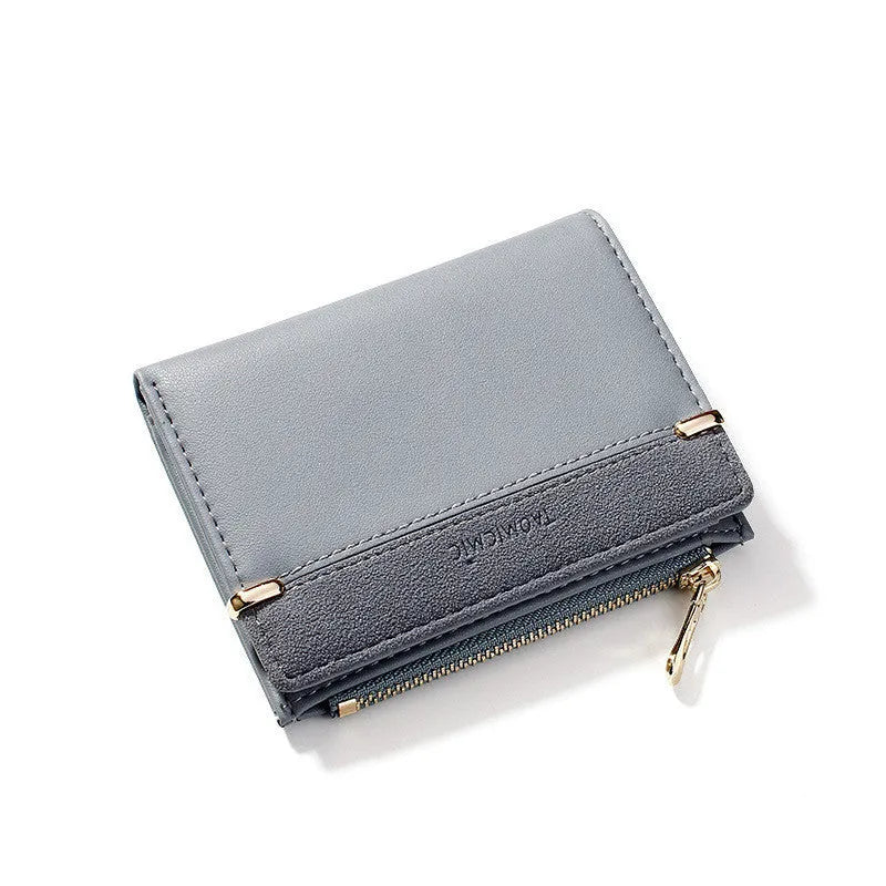 Short ladies wallet with zipper closure showing multi card slots and compartments in PU leather
