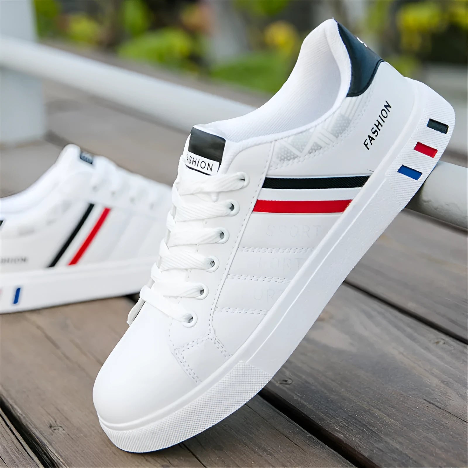 Men's sports shoes shown in black, also available in grey and white, with EU size tags from 39 to 44.