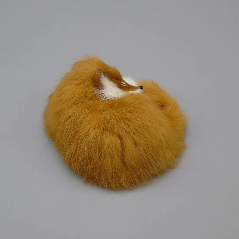 Artificial white fox fur car decoration on vehicle dashboard showing soft texture and compact size
