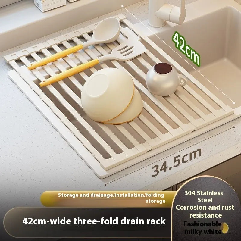 Milky white foldable stainless steel kitchen draining rack shown over a sink.