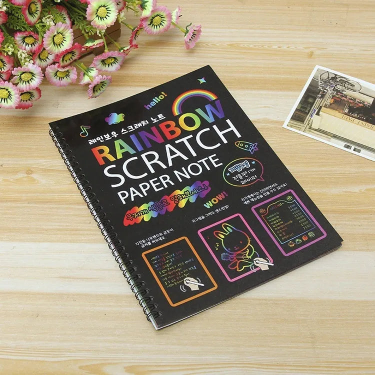Children's large format scratch art paper with colourful puzzle design and scraper tool