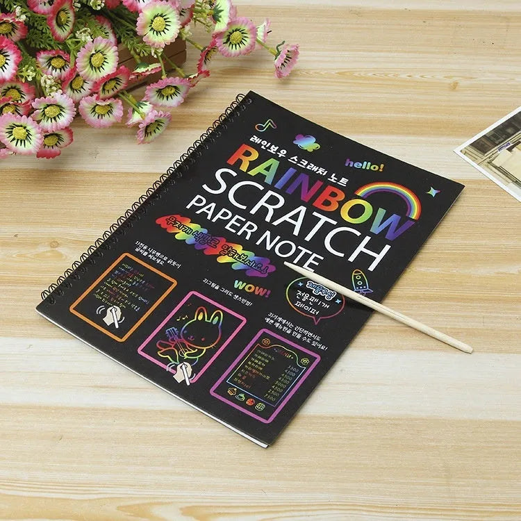 Children's large format scratch art paper with colourful puzzle design and scraper tool