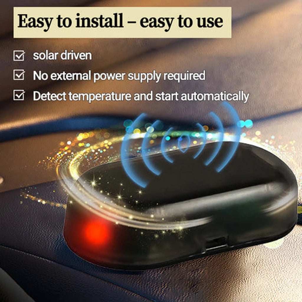 Black handheld car deicing tool with special glass component on a white background.
