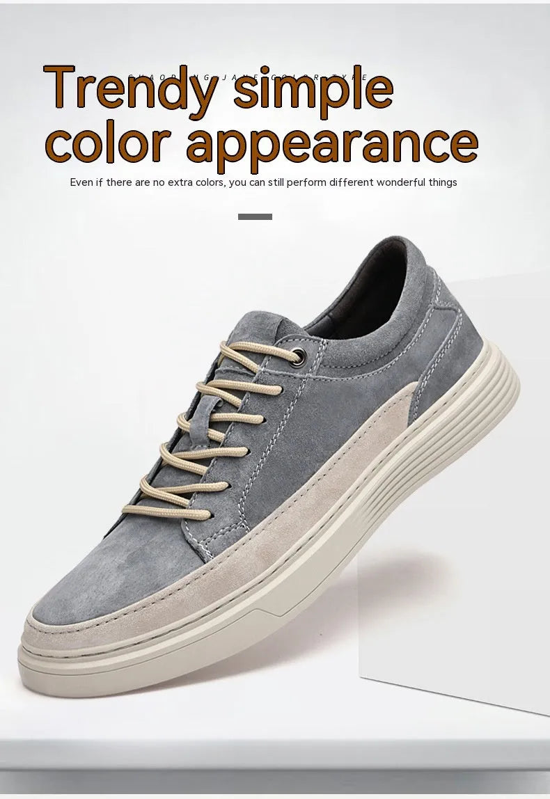 Men's grey casual leather skate shoes with round toe, low top design and rubber soles