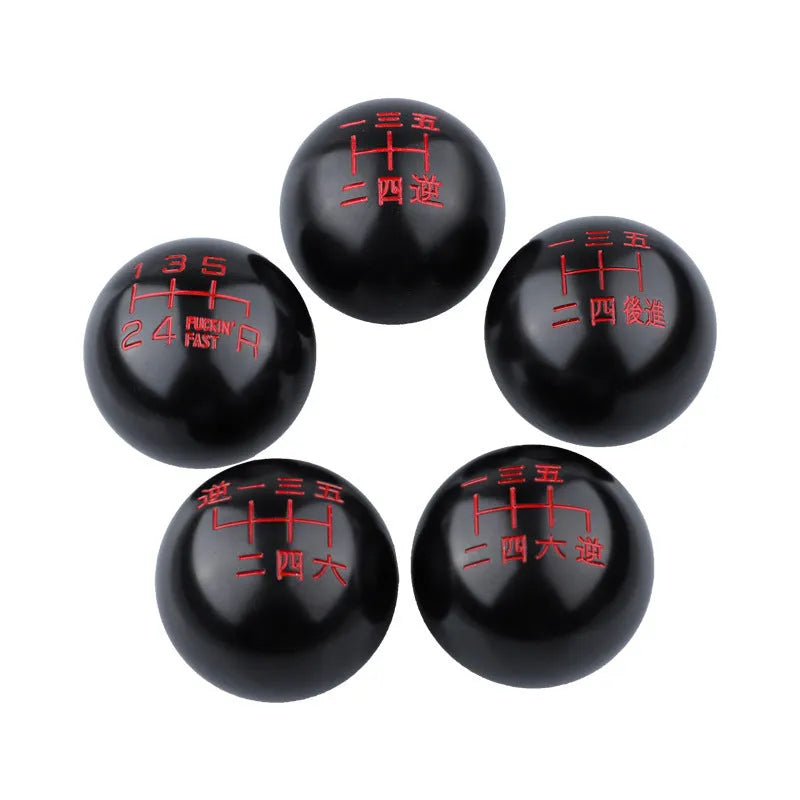 Aluminium alloy round car gear shift head shown in one of five available style variations.
