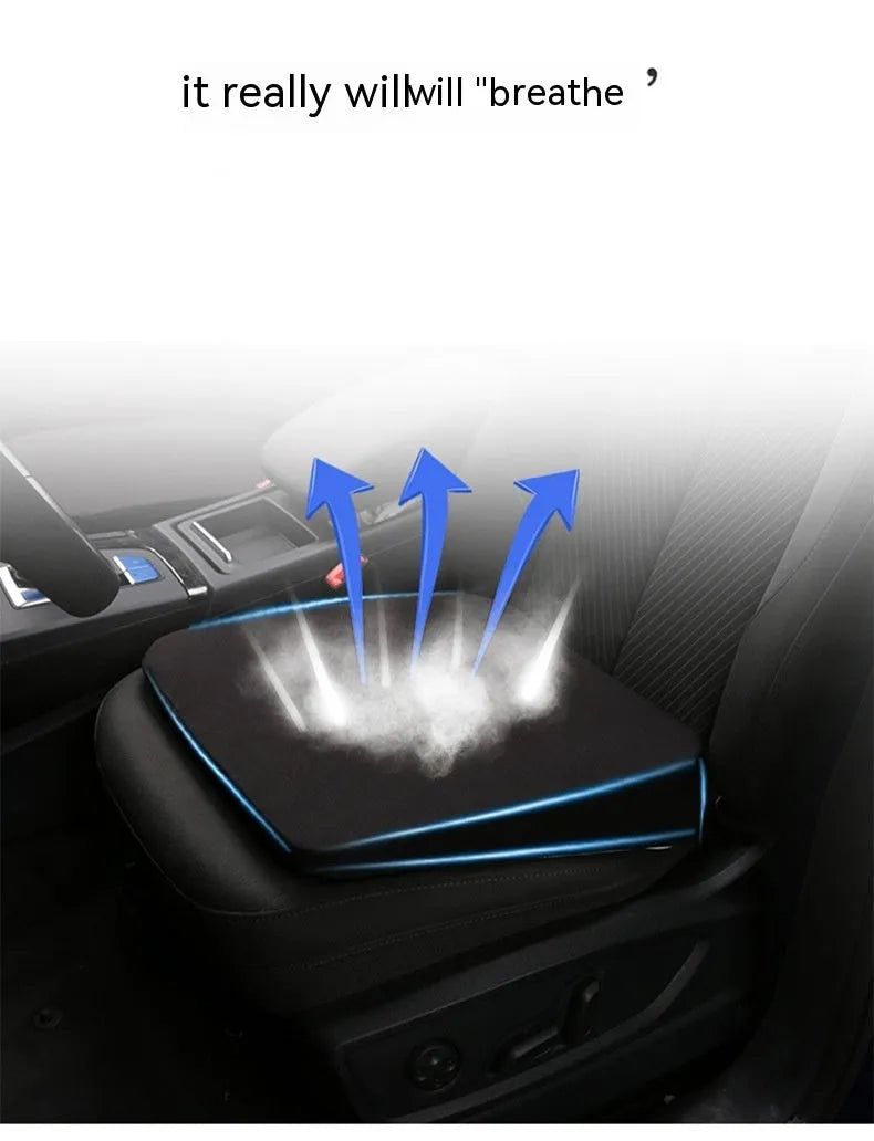 Black car seat cushion for heightening and comfort, shown on a vehicle seat.