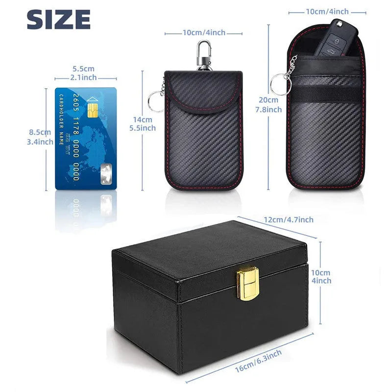 Carbon fibre design RFID shielding box and two matching key cases on a table.