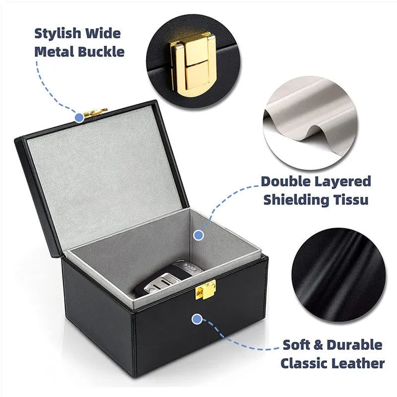 Carbon fibre design RFID shielding box and two matching key cases on a table.