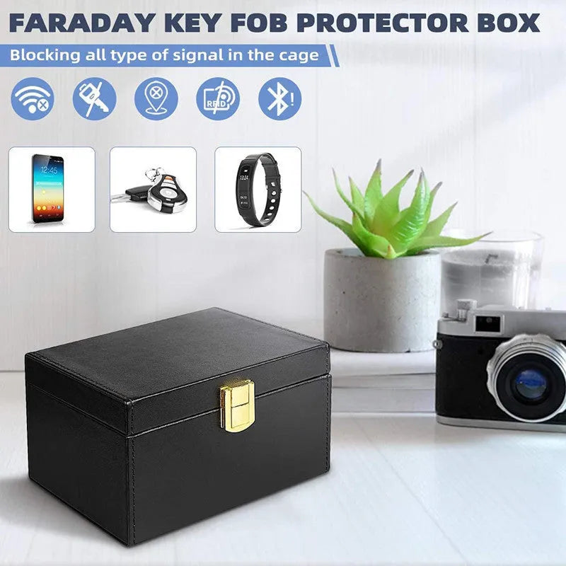 Carbon fibre design RFID shielding box and two matching key cases on a table.