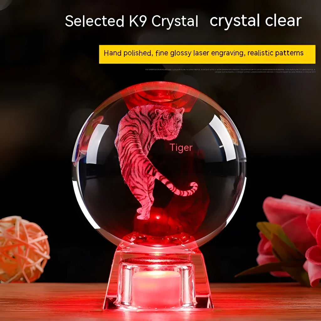 White crystal zodiac decorative ball with electronic base lighting showing Chinese-style animal design