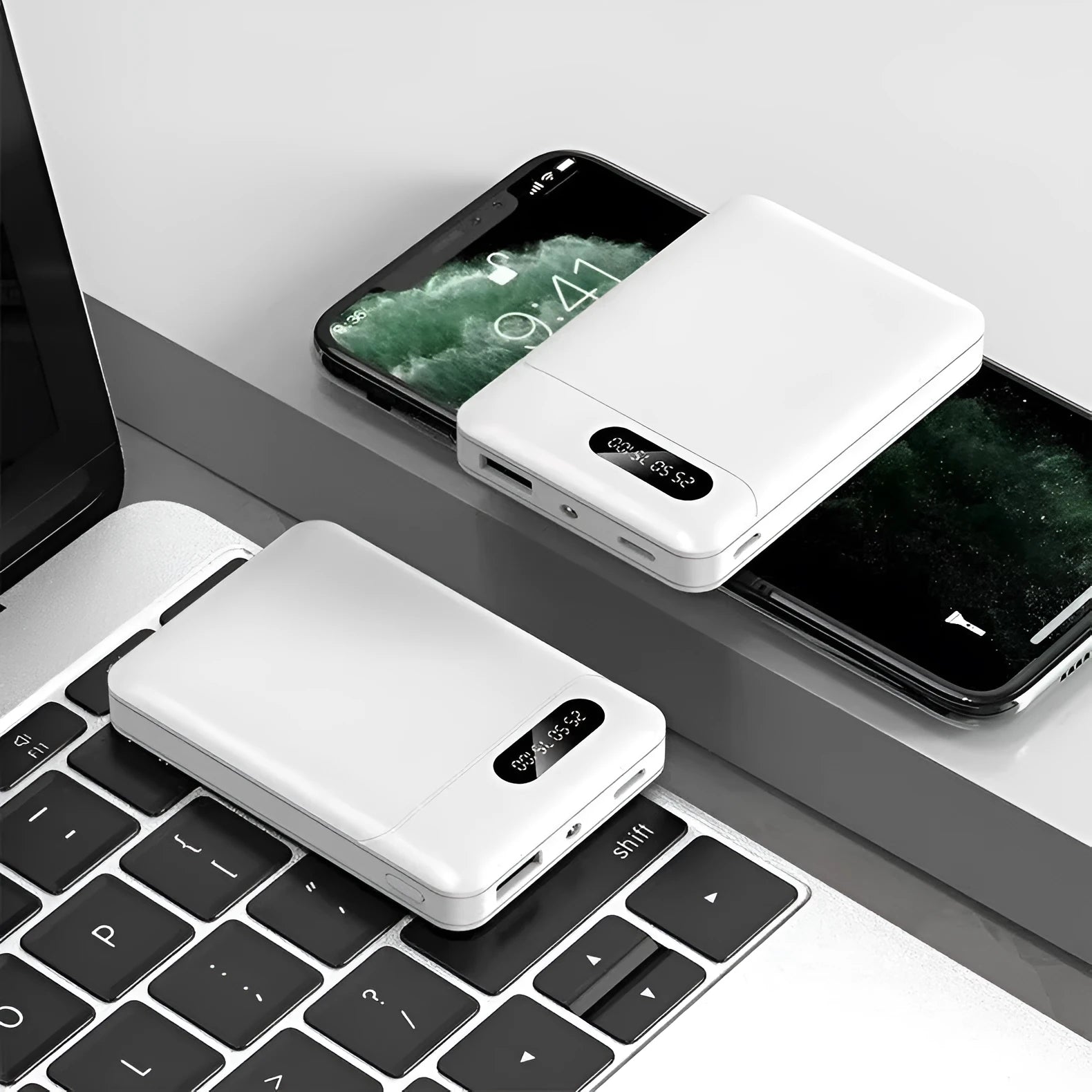 White and black portable power bank with multiple capacity options and USB charging ports