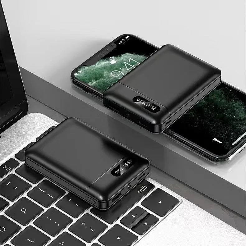 White and black portable power bank with multiple capacity options and USB charging ports