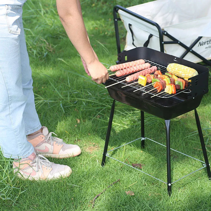 Portable metal barbecue oven in black, dimensions 29x12x44cm, suitable for camping and outdoor use