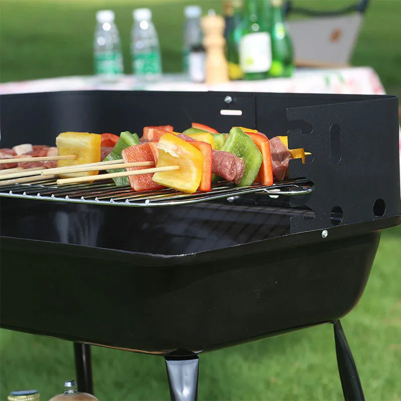 Portable metal barbecue oven in black, dimensions 29x12x44cm, suitable for camping and outdoor use
