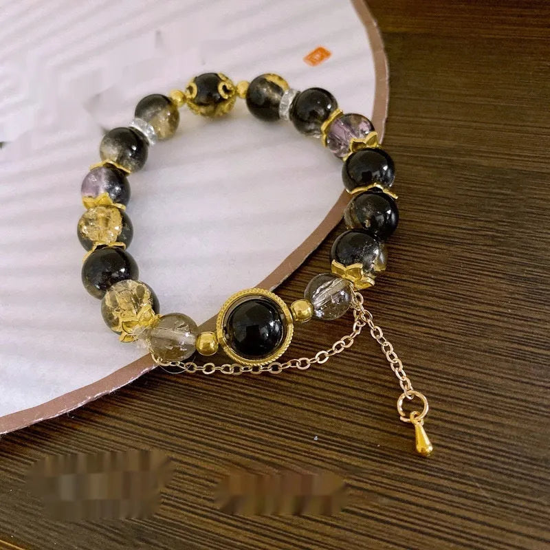 Chinese style glass bracelet with bamboo joint details in a red Lvzhu Duobao design.