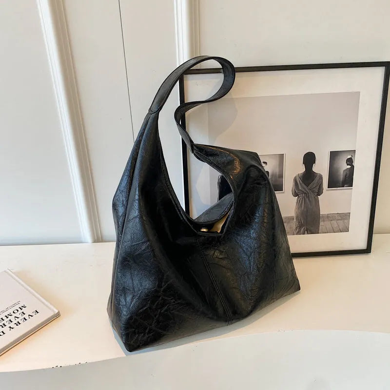 Casual soft leather shoulder bag with large capacity and sandwich pocket in street trend style
