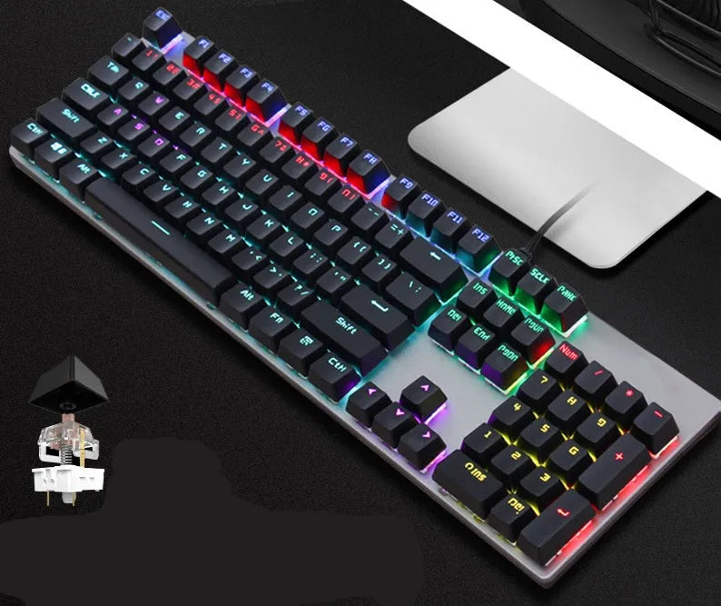 AOC GK410 wired mechanical keyboard with backlit keys on a desktop, showing full 104-key layout.