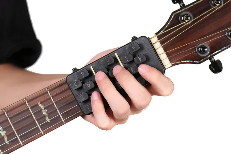 Guitar Aid plastic string press for guitar chord practice and rebound assistance