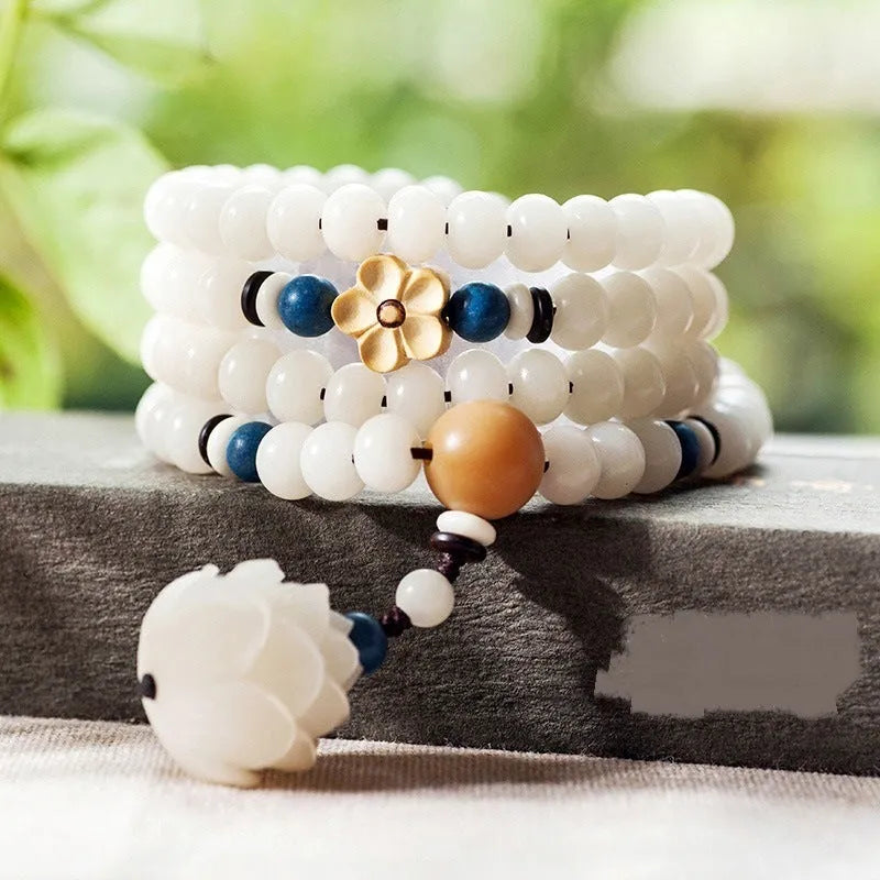 White jade Bodhi beads long bracelet with 6x8mm beads, showing various style options.