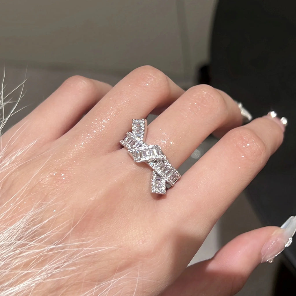 Silver cross open ring with bow shape, copper base, electroplated finish, light luxury style