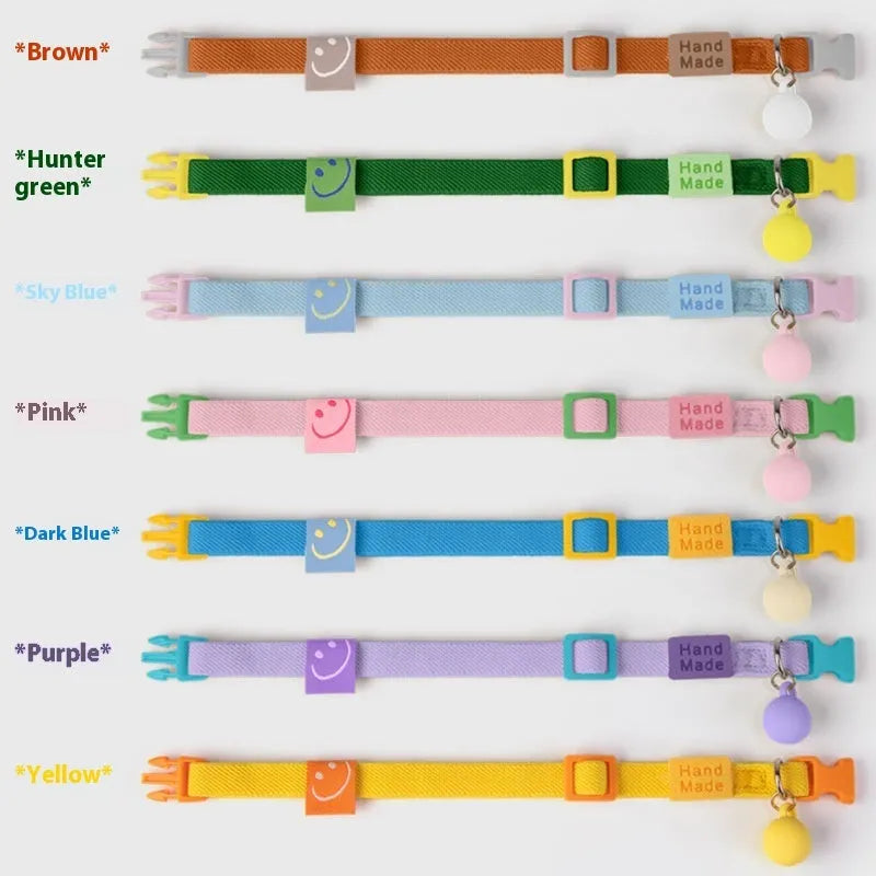 A small dog collar made from high elasticity polyester in an adjustable size, shown in one of seven available colours.