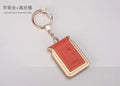 Bluetooth dual SIM adapter keychain for iOS with multiple colour options including black leather