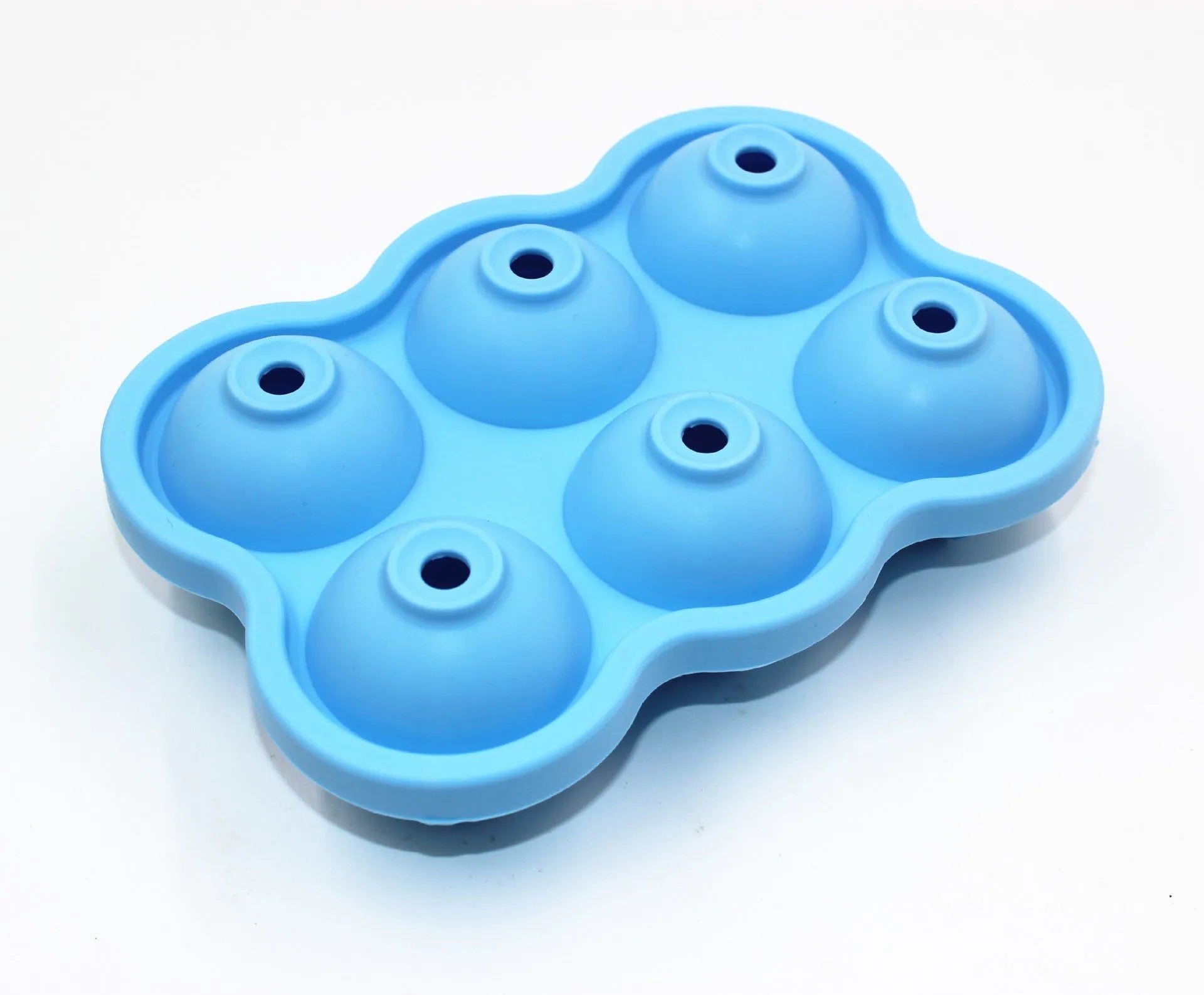 Large black silicone ice cube maker with six 4.5cm sphere cavities on a white background