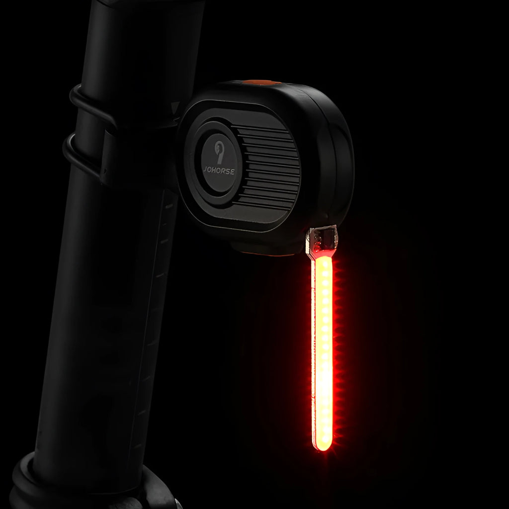 Bicycle tail light with running water illumination effect in multiple colour options
