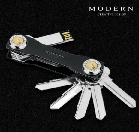 Multi-function metal keychain with stainless steel and anodised aluminium finish, featuring split ring and carabiner, in grey colour option.