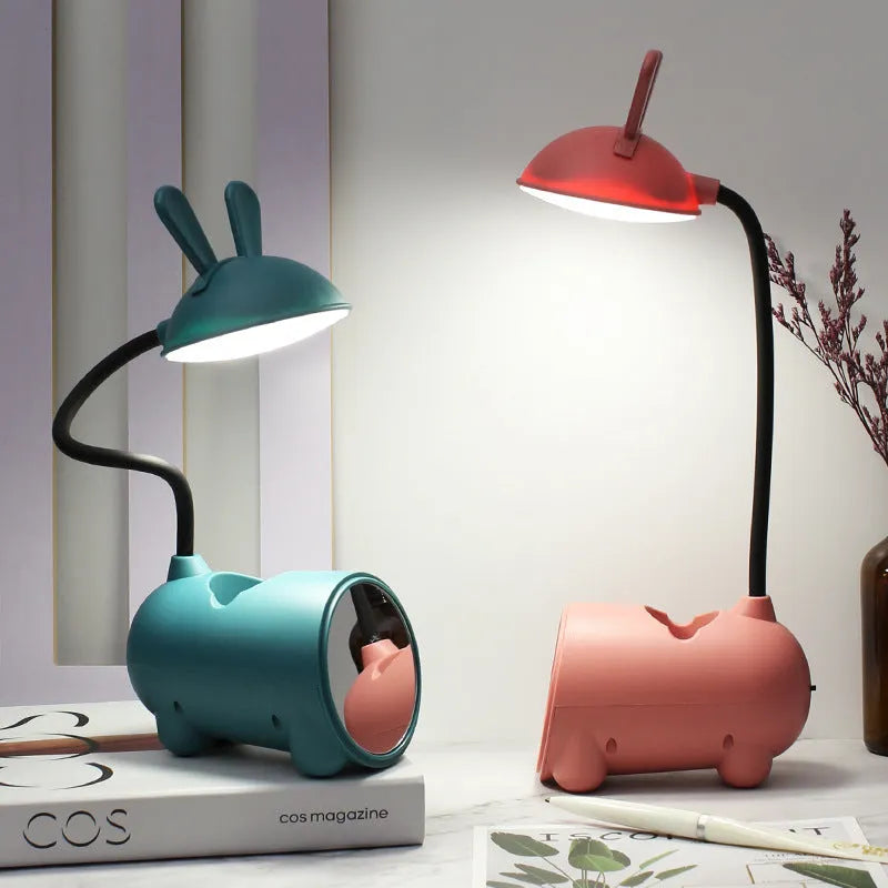 Cartoon-style desktop table lamp with pen container in green, dark blue, or pink colours
