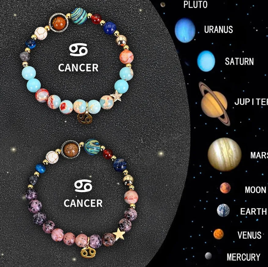 Set of two natural stone beaded bracelets showing zodiac sign designs on elasticated cords