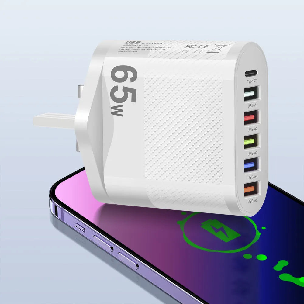White plastic USB charging plug with interchangeable UK, US, and EU power outlets for Type-C phones.