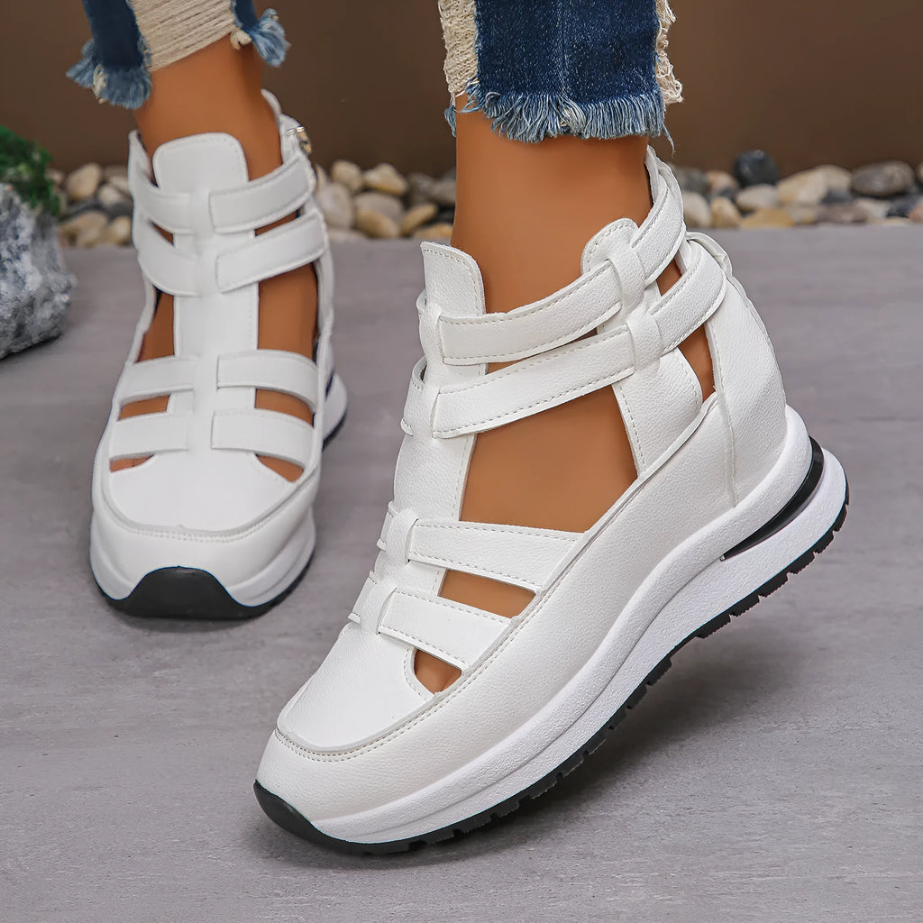 Women's black close-toed hollow-out platform sandals with Velcro fastening showing round toe design