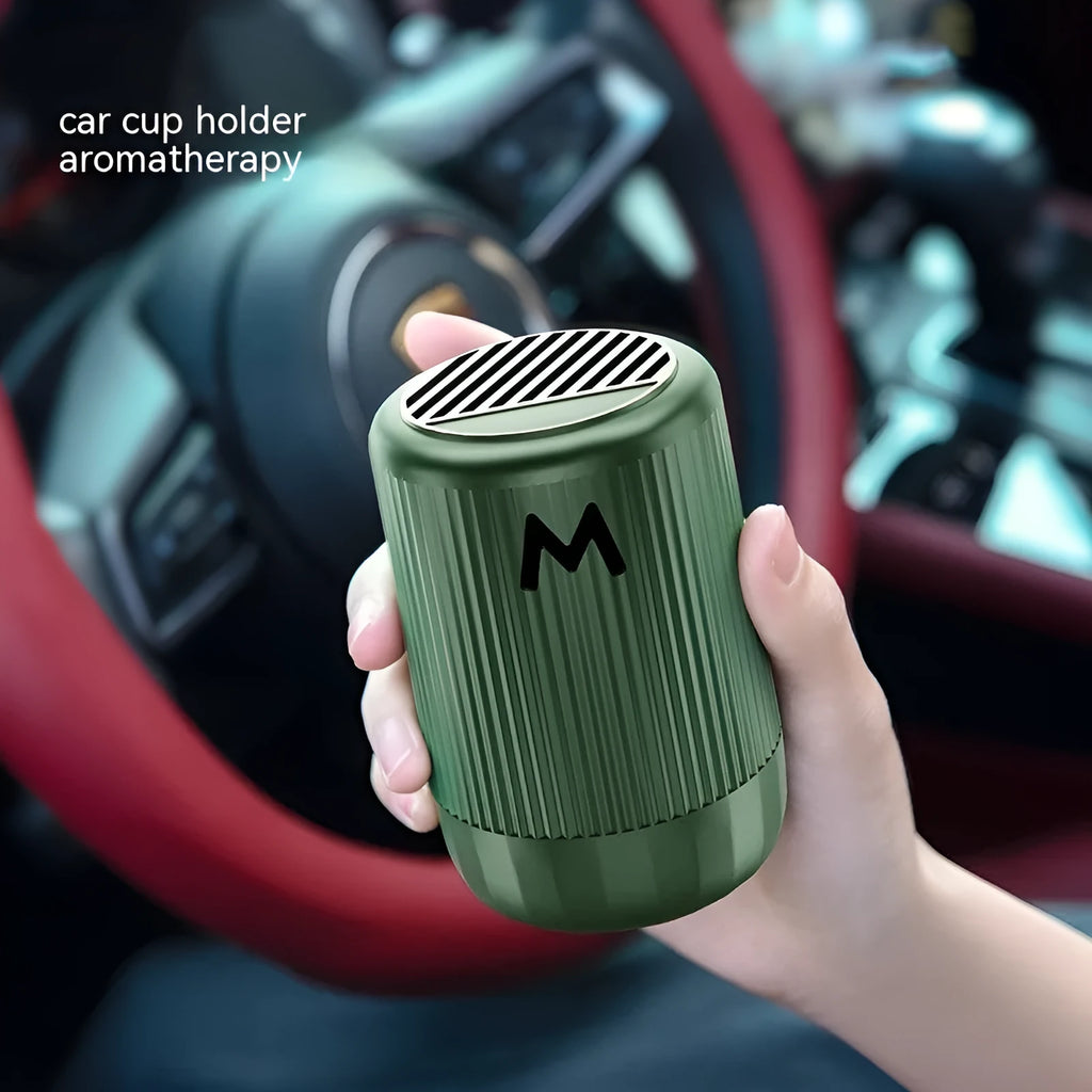 Solid aromatherapy cup for car and home use in choice of four scents, measuring 10 cm by 6 cm.