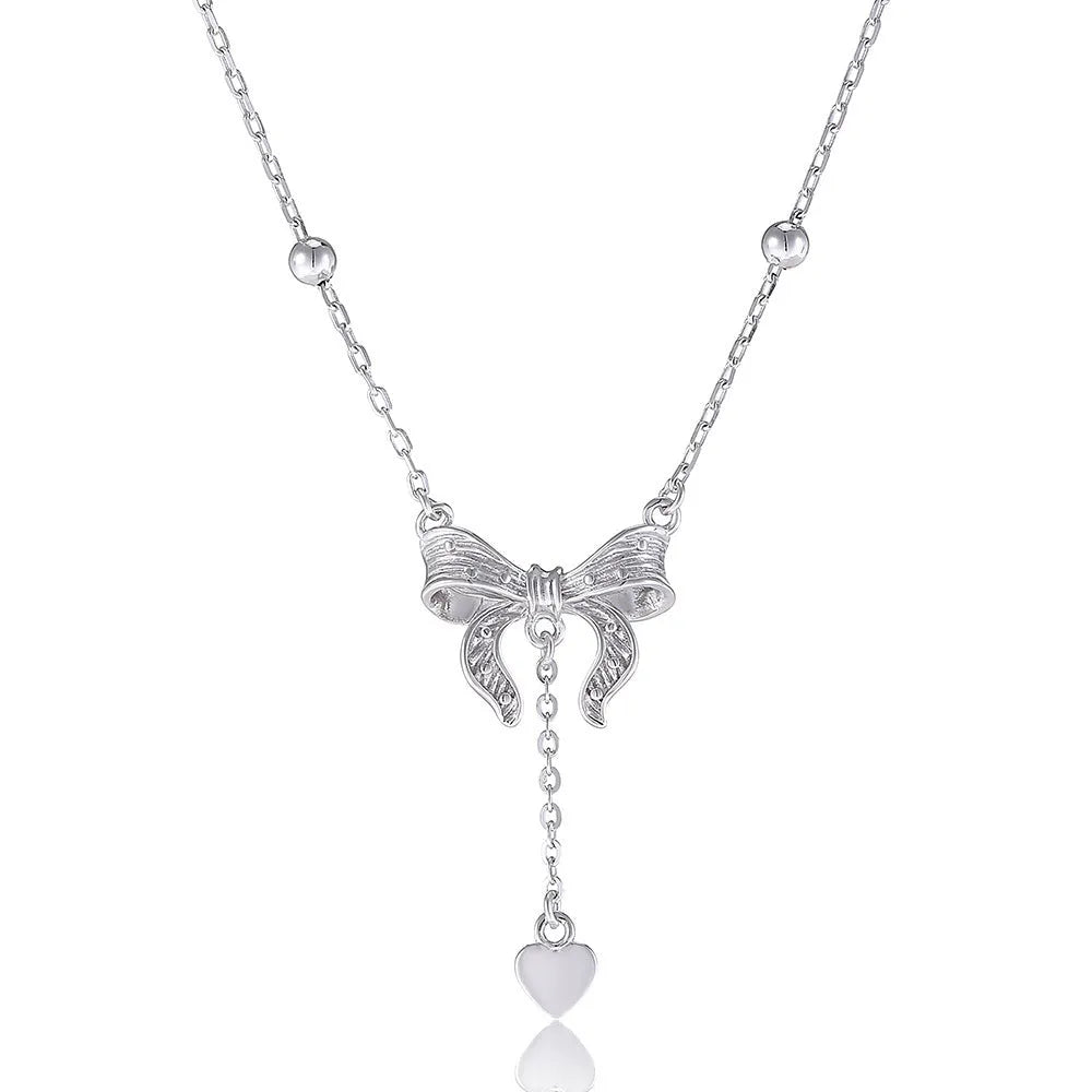 925 sterling silver necklace with a detailed butterfly and heart-shaped pendant on an adjustable O-ring chain.