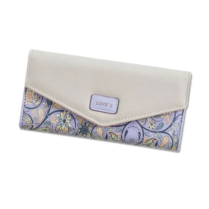 Women's three-fold leather wallet with buckle closure in black, blue, green, melon red or violet