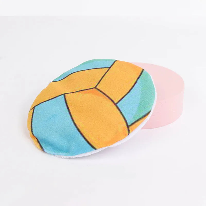 Flat disc cat toy with sports ball pattern measuring 5cm containing catnip and crinkle sound