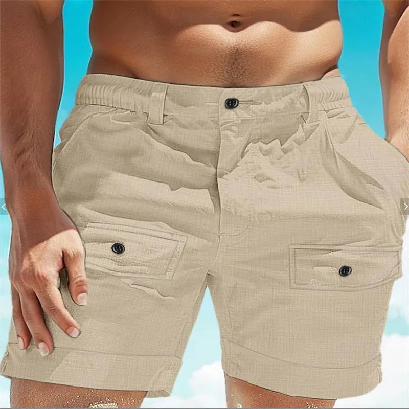 Men's khaki linen shorts with elastic waistband and button pocket laid flat.
