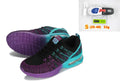 Women's casual running shoes in black with mesh lining and front lace-up closure