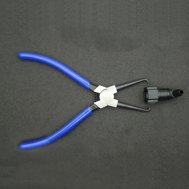 Iron caliper tubing pliers with rubber-coated handles and specialised jaws for fuel line connectors.