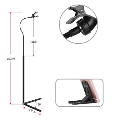 Black mobile phone bed bracket mounted bedside with adjustable overhead support shelf holding smartphone